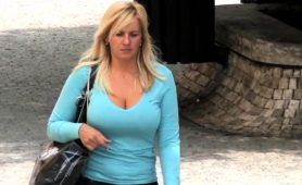 street-voyeur-finds-a-big-breasted-blonde-cougar-outside