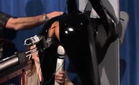 Helpless Brunette In Latex Is Made To Cum Hard With Sex Toys