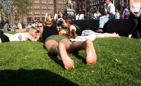 amateur-blonde-teen-exposes-her-lovely-feet-under-the-sun